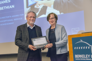 ALD Kathy Yelick presents the Director’s Award for Exceptional Service Achievement to James Sethian. David Brown accepts on Jamie’s behalf.